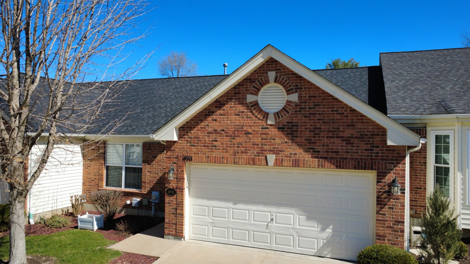 Emmendorfer Exteriors family crew installing a new asphalt shingle roof on a Union, Missouri home