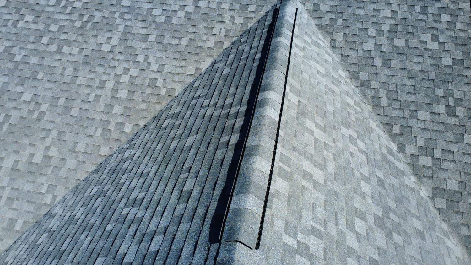 Wide aerial of a large completed low-slope roof by Emmendorfer Exteriors in Franklin County, Missouri