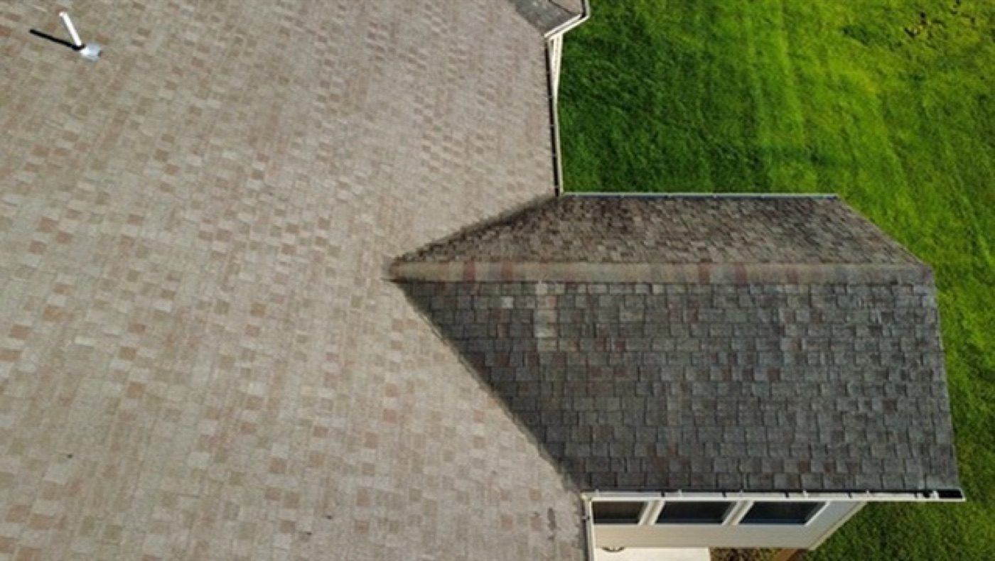 Aged, weathered roof before replacement by Emmendorfer Exteriors in Union, MO, drone view