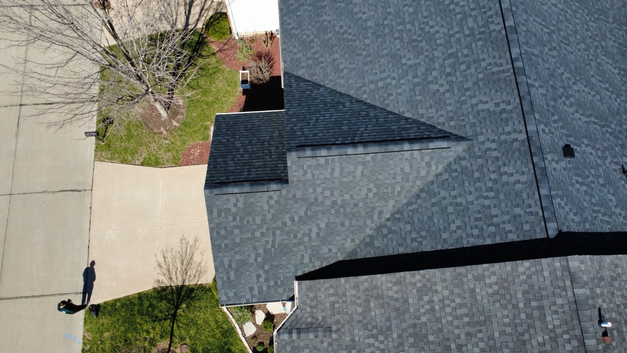 Low-slope torch-down roofing on a porch addition